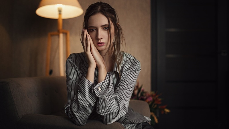 couch, Sergey Fat, frustration, door, brown hair, brunette, waiting, hairstyle, lamp, depression - sadness, young women, dress, emotion, indoors, head in hands
