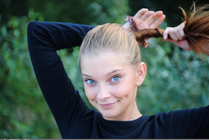focus on foreground, ponytail, emotion, women, blonde, hair, neck, smiling, portrait, young women, happiness, front view, looking at camera, Indiana A