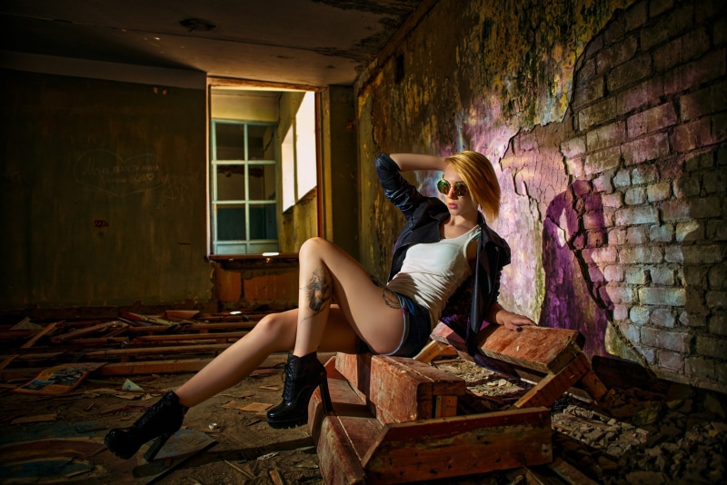 model, tattoo, Vladimir Talantcev, painted nails, blonde, 2K, leather jackets, women, jean shorts, high heels, abandoned, indoors, sitting, women with shades