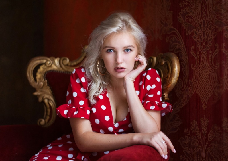 red, pink nails, Christina Artemyeva, hairstyle, long hair, innocence, sitting, shock, women, Maxim Maximov, blue eyes, front view, girls, polka dots, one person