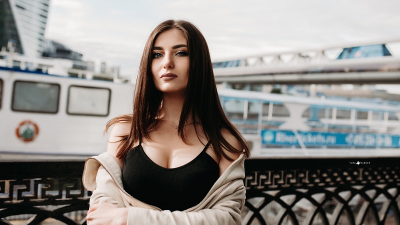 blue eyes, long hair, looking at viewer, brunette, Yura Warner, jacket, bare shoulders, portrait, black tops, Julia, women, 2K, face, arms crossed, straight hair