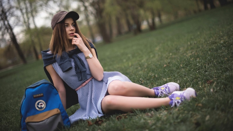 brown hair, Park, makeup, lawn, backpack, sneakers, jacket, bokeh, trees, 2K, girl, thought, on the grass, hairstyle, dress, Yura Warner, sitting, Lena