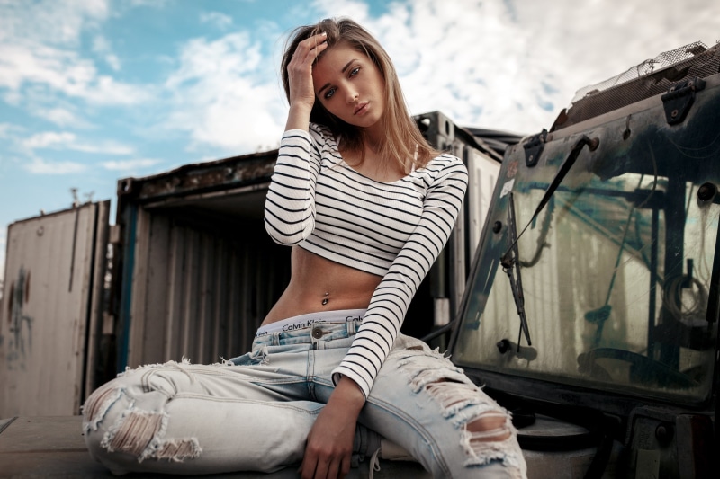 belly, women, torn jeans, pierced navel, women outdoors, tanned, 1080P, Calvin Klein, sitting, portrait