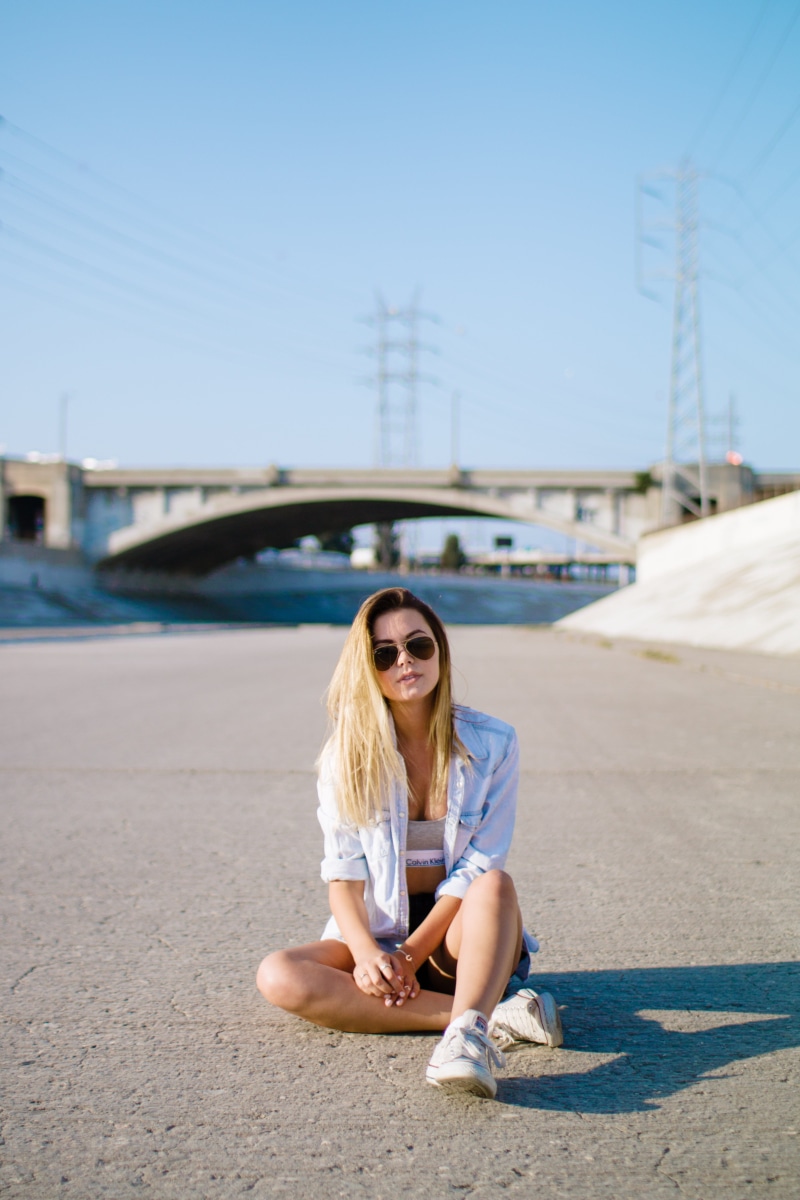 young women, young adult, calvin klein, built structure, leisure activity, breathe, model, sunlight, sky, bridge, lifestyles, los angele, one person, daytime