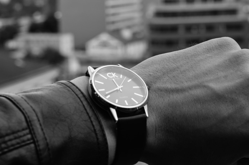 clock, close-up, body part, day, photography, focus on foreground, architecture, finger, analog, watch, grayscale, men, no people, calvin klein, instrument of time