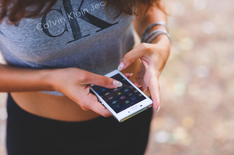 girl, s, selective focus, Calvin Klein, midsection, phone, day, human body part, mockup, casual clothing, hands, communication, human hand, touchscreen