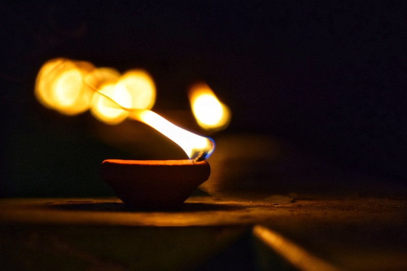 night, indoors, oil light, luminosity, close-up, burning, oil lamp, diya - oil lamp, festival, 5K, lighting equipment, illuminated, diwali, electric lamp