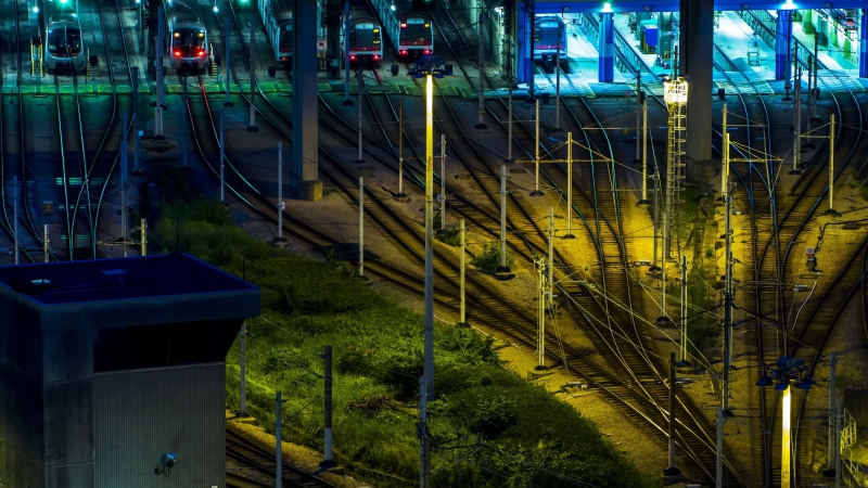 yellow, plant, transportation, building exterior, reflection, nature, architecture, city, digital, outdoors, high angle view, night, connection