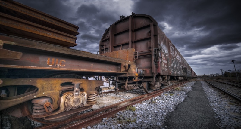 sky, mode of transportation, shunting yard, obsolete, cloud - sky, abandoned, day, railway, rail transportation, deterioration, railroad car, rusty, outdoors