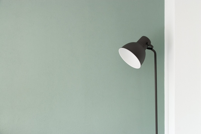 built structure, door, lampshade, white color, lamp, minimal, low angle view, hanging, teal, light, floor, black color, close-up, corner, wall, electricity