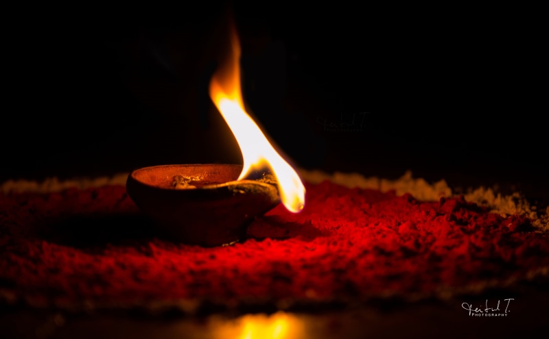 brown, oil lamp, Aero, candle, no people, glowing, close-up, 5K, black background, diwali, holder, flame, heat - temperature, spirituality, illuminated