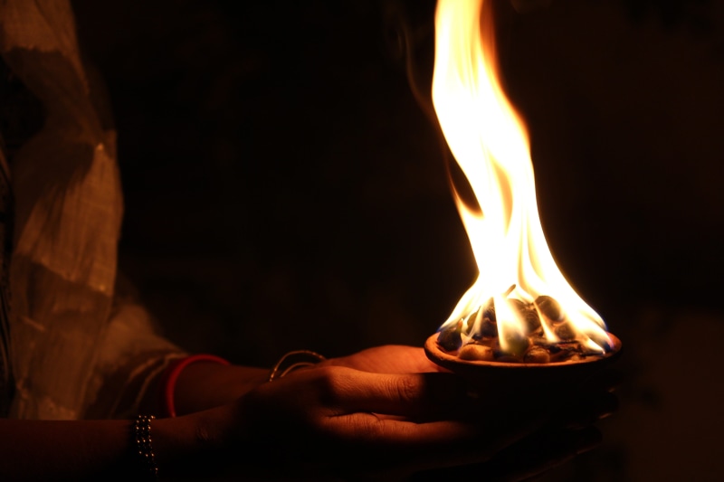 deepawali, happy, human hand, candle, man, electric lamp, diya, woman, spirituality, spiritual, god, people, igniting, glowing, hand, indian, ethnic, bright