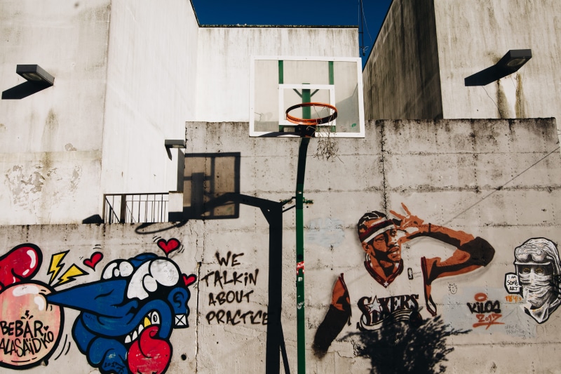 sunlight, electric lamp, mural, wall, street photography, street art, architecture, lighting equipment, no people, painting, art and craft, day, building