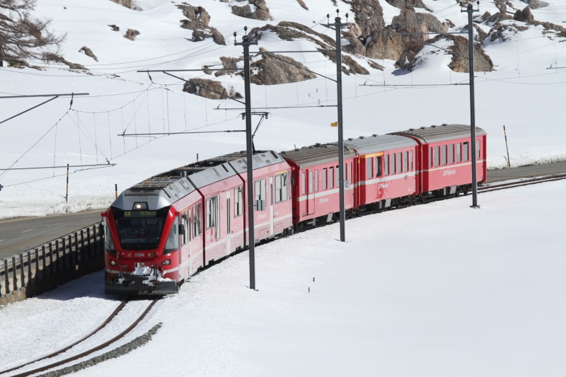 engadin, regional train, day, travel, train - vehicle, no people, train, world heritage, narrow gauge, winter, covering, switzerland, rhaetian railway