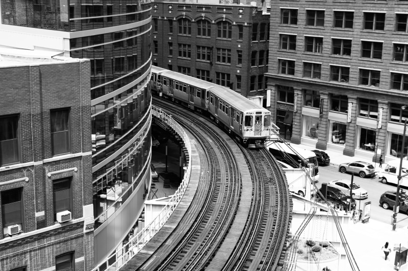 cars, downtown, rail transportation, mode of transportation, city life, outdoors, city, nature, day, metro, railroad, group of people, traffic, railroad track