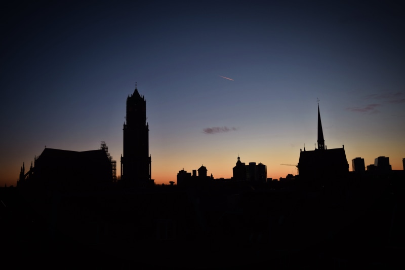 dawn, silhouette, office building exterior, building exterior, spire, church, copy space, steeple, tourism, building, dusk, urban, tall - high, the netherlands