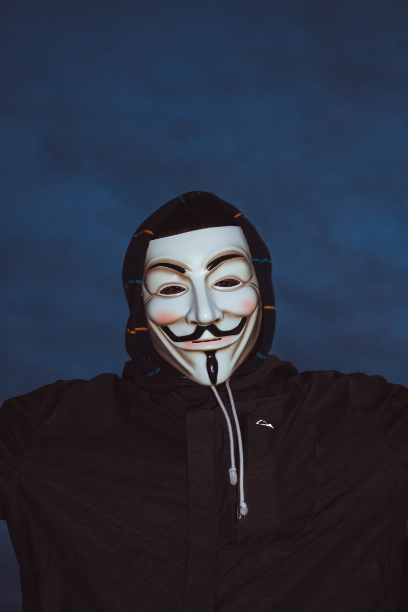 obscured face, looking at camera, one person, close-up, young adult, mask - disguise, portrait, fashion, representation, 5K, mask, disguise, unrecognizable person