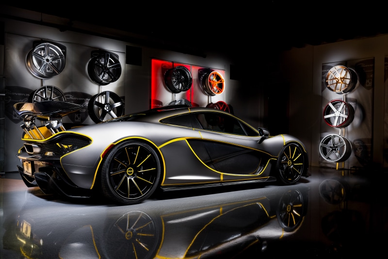design, motor vehicle, garage, indoors, time, shopping, reflection, no people, arrangement, glass - material, land vehicle, gray, stationary, still life