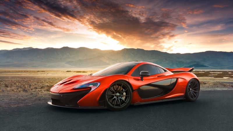 road, scenics - nature, mountain, car, mode of transportation, red, wheel, orange color, land vehicle, mountain range, transportation, motor vehicle, maclaren p1