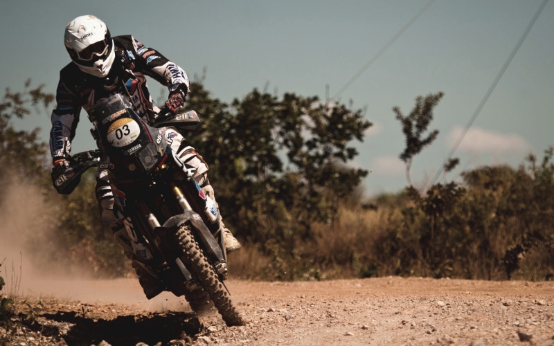 dust, mode of transportation, land vehicle, nature, crash helmet, ride, sports Race, sports Track, motion, road trip, spain, danger, motorcycle, bike, headwear