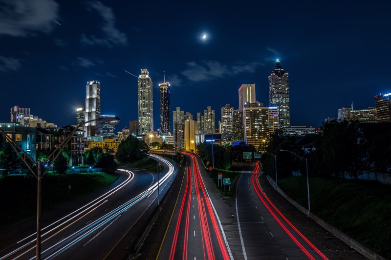 tower, nature, illuminated, night, city life, built structure, motion, road, 5K, outdoors, lighted, sky, financial district, building, modern, building exterior