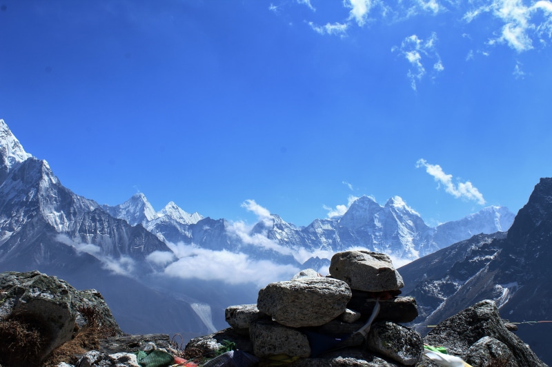 outdoors, snow, winter, rock - object, tranquility, day, memorial, sky, no people, solid, mountain range, everest base camp trek, beauty in nature, 5K