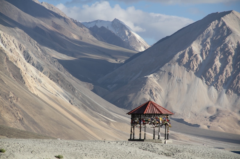 pangong tso, kashmir, blue, ladakh, building exterior, india, mountain peak, lake, outdoors, hut, tourists, mountain range, travel, environment, non-urban scene