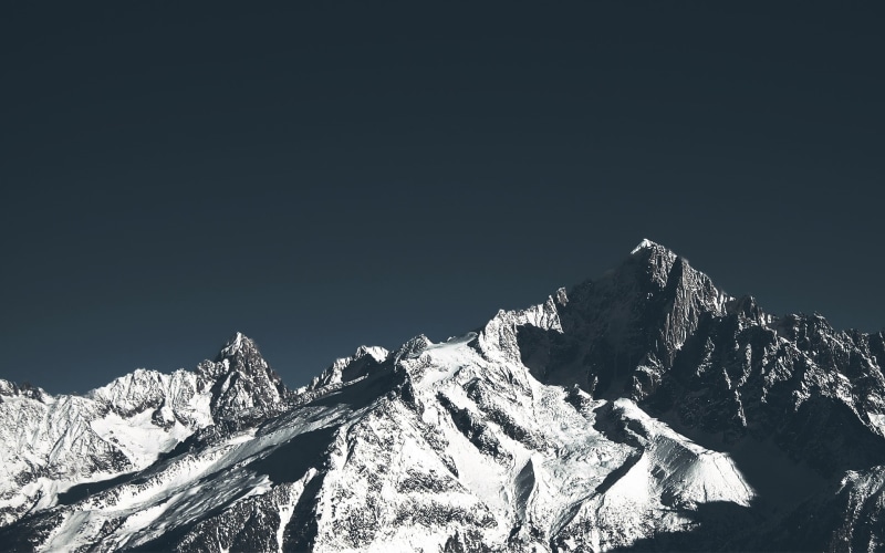 sky, mountain peak, mountain, clear sky, tranquil scene, nature, copy space, rocks, environment, covered, winter, scenics - nature, mountains, beauty in nature