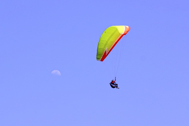 unrecognizable person, blue, gliding, nepal, lifestyles, mid-air, transportation, freedom, sky, joy, sport, outdoors, extreme sports, one person, adventure