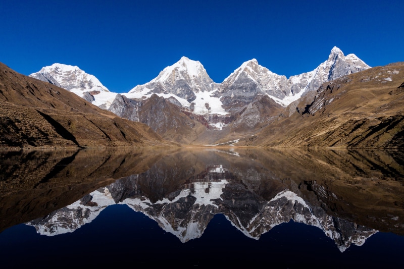 water, beauty in nature, snowcapped mountain, mountain range, blue, environment, mountain peak, mountain, winter, cordillera, laguna carhuacocha, no people