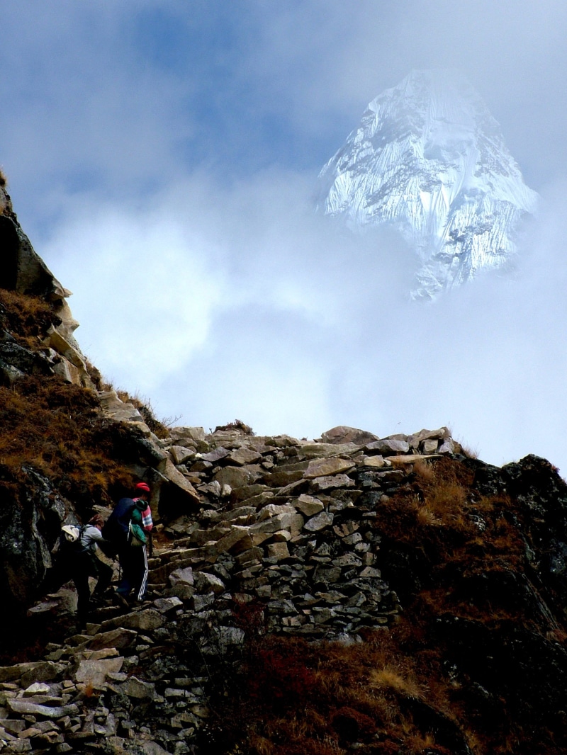 outdoors, climbing, Himalayas, Mountain, extreme terrain, a view of the mountains, cloud - sky, sky, lifestyles, rock - object, Ama Dablam, hiking, adventure