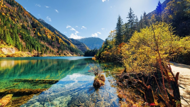 mountainous landforms, tranquil scene, water, china, day, mountain, lake, sky, sunlight, sichuan, jiuzhaigou nature reserve, 1080P, outdoors, forest, no people