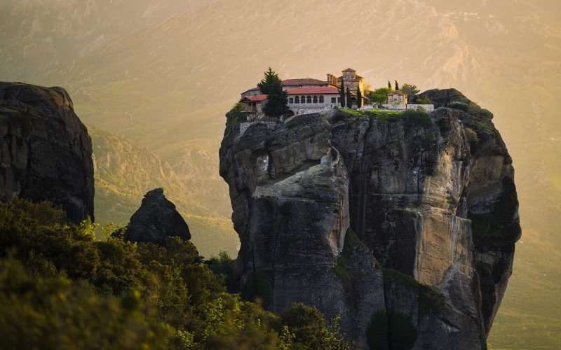 mist, solid, building, outdoors, landscape, Greece, rock formation, religion, nature, no people, Meteora, beauty in nature, mountain, monastery, mountains