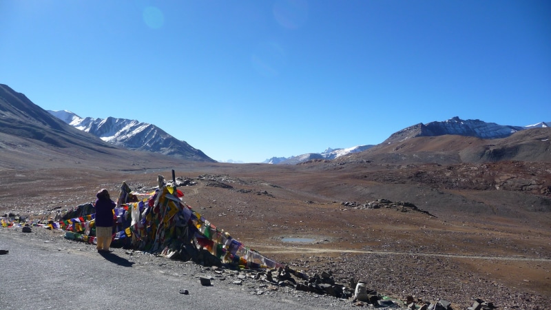 sky, scenics - nature, hiking, landscape, mountain, outdoors, extreme terrain, ladakh, flag, travel, travel destinations, walking, non-urban scene, land