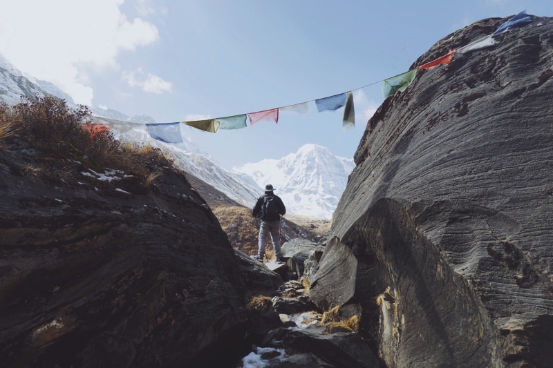 ghandruk, mountain range, real people, lifestyles, leisure activity, rock - object, sky, person, activity, wanderer, men, leisure activities, 5K, scenics - nature