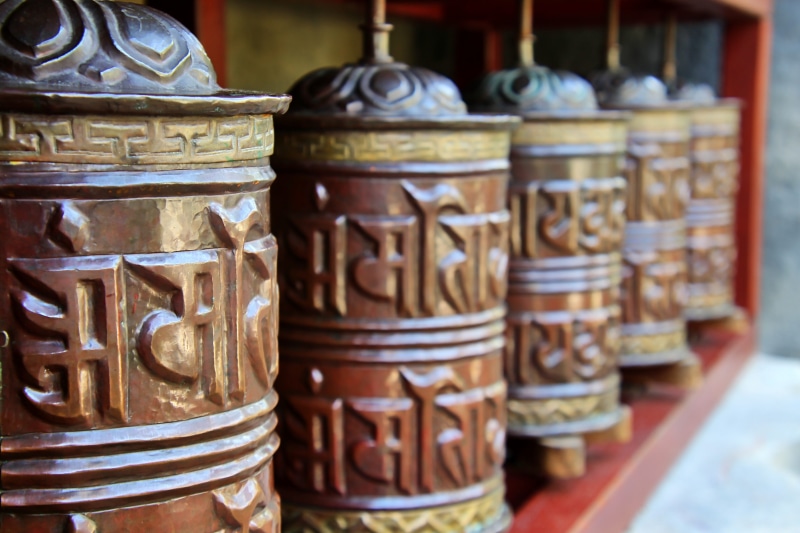 tibet, pattern, food, metal, retail, arrangement, choice, group of objects, culture, 4K, no people, buddhist, container, focus on foreground, prayer wheels