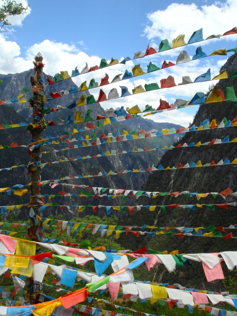 belief, culture, place of worship, bunting, cloud - sky, outdoors, no people, religion, nepal, day, hanging, nature, buddhism, sky, nepalese, asia, multi colored