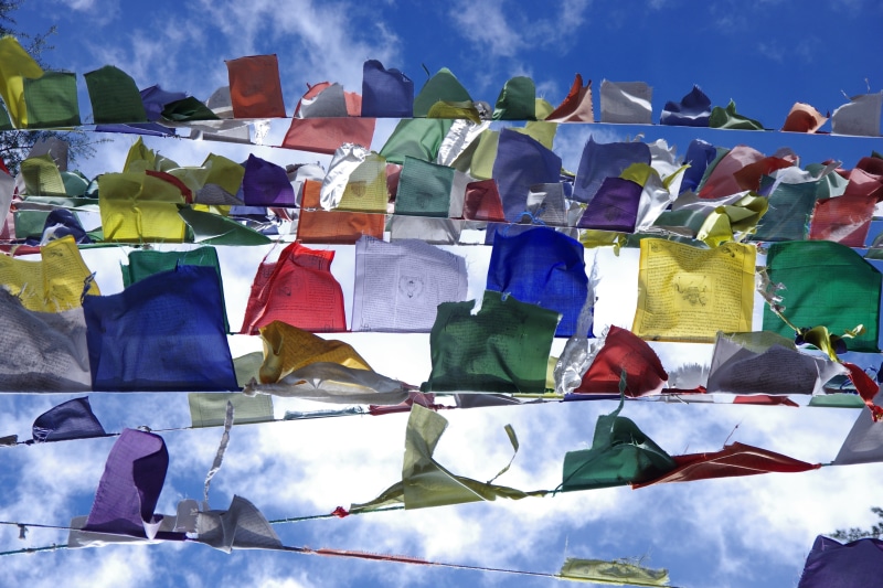 representation, paper, creativity, assorted, belief, buddhism, spirituality, pattern, flags, outdoors, cloud - sky, 4K, no people, india, blue, culture