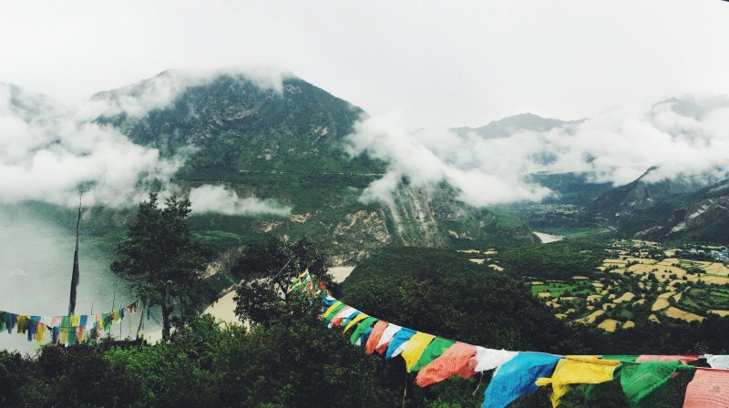 peak, outdoors, mountains, tree, land, banner, summit, beauty in nature, no people, tranquil scene, symbol, sky, wind, top, religion, colorful, tranquility