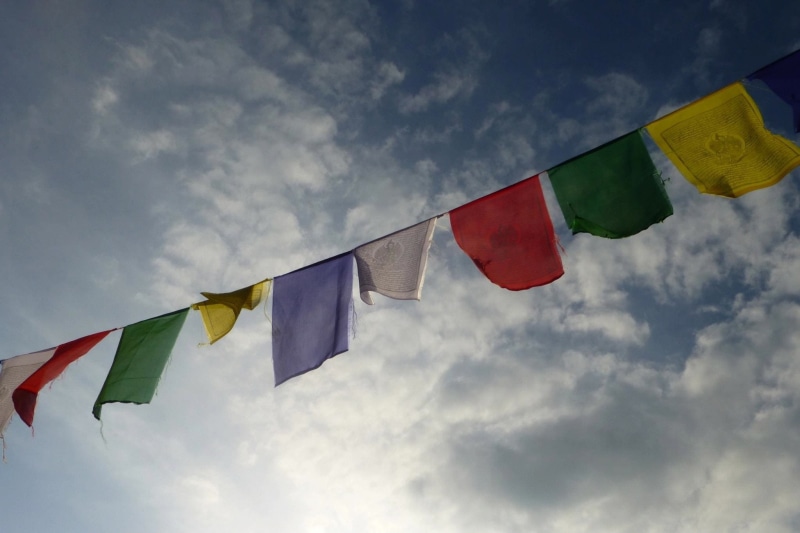 religion, environment, symbol, shape, day, traditional, nature, cloud - sky, red, spiritual, himalaya, wind, prayers, multi colored, low angle view, colorful