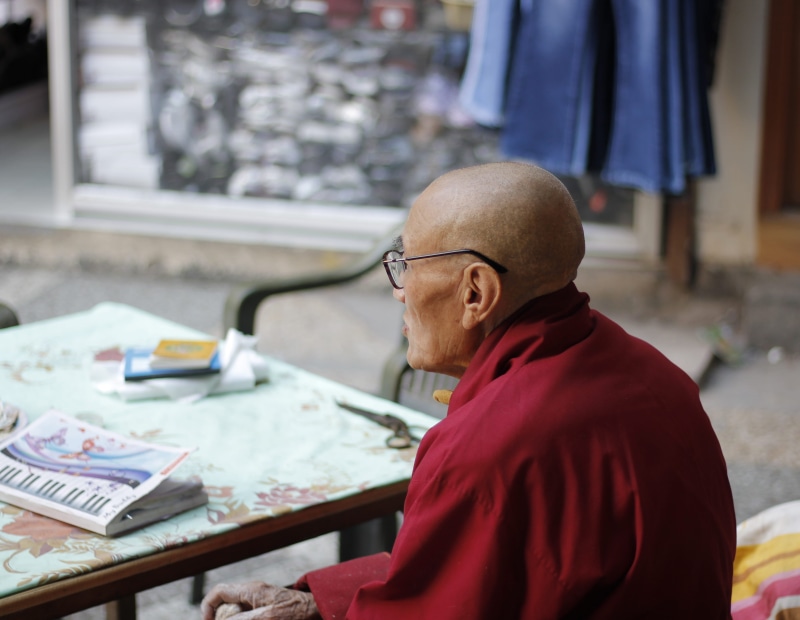 culture, senior citizen, senior men, shirt, text, day, india, senior adult, old, furniture, majnu ka tilla, monk, human, man, wearing, real people, chair