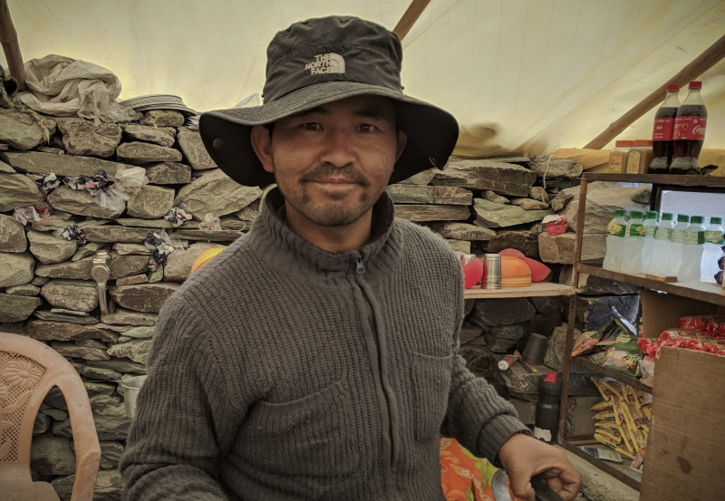 real people, standing, casual clothing, india, portrait, beard, 2K, facial hair, shopkeeper, cap, men, mid adult, one person, keylong-leh rd, front view