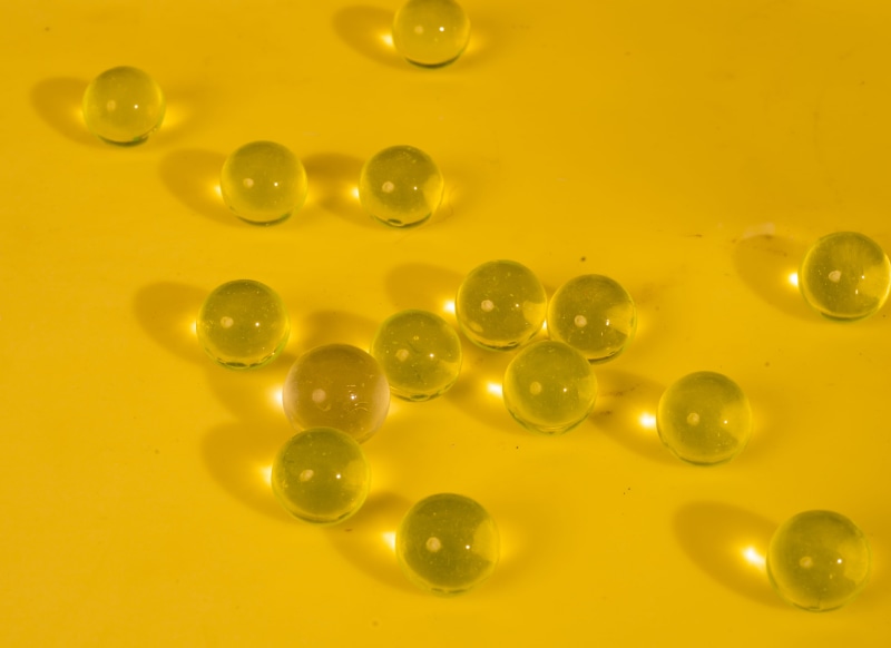 floating on water, pattern, 4K, abstract backgrounds, sphere, cooking oil, yellow, circle, backgrounds, studio shot, geometric shape, abstract, orb, textured effect