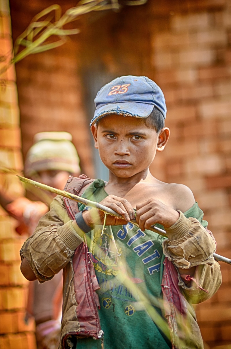 front view, standing, cultures, focus on foreground, asia, men, one person, people, males, extreme poverty, pre-adolescent child, poor kid, portrait, boys