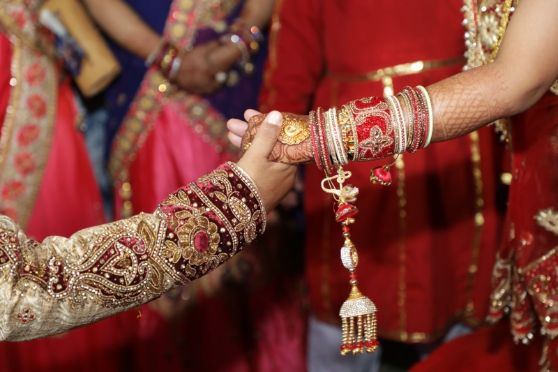 wedding, event, hands, wedding ceremony, women, positive emotion, bracelets, person, couple - relationship, wearing, celebration, people, fashion, holding hands