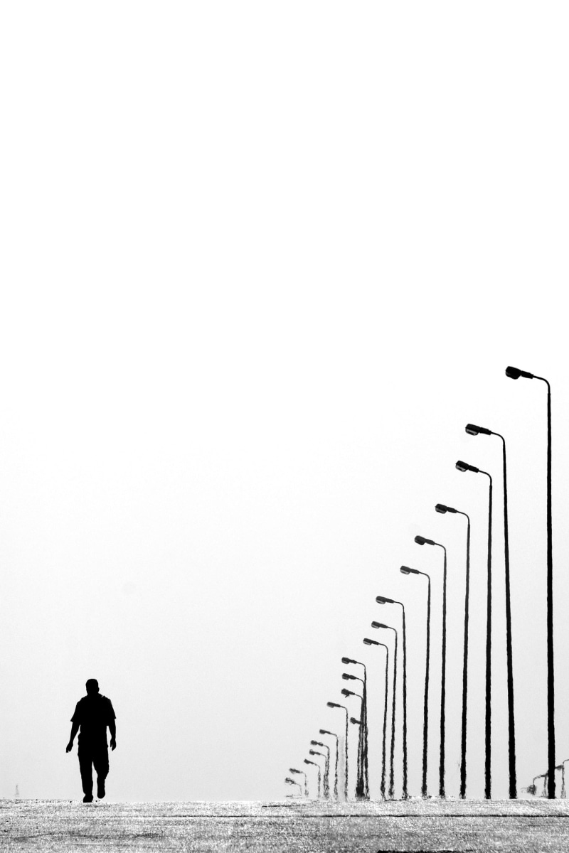 standing, water, nature, full length, walking, 2K, leisure activity, lamp, real people, post, one person, clear sky, day, road, street lamps, rear view