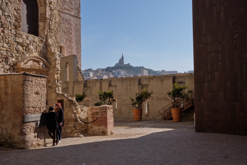 marseille, france, rear view, day, 5K, history, built structure, yellow rock, alignment, sky, lifestyles, religion, castle, building exterior, people