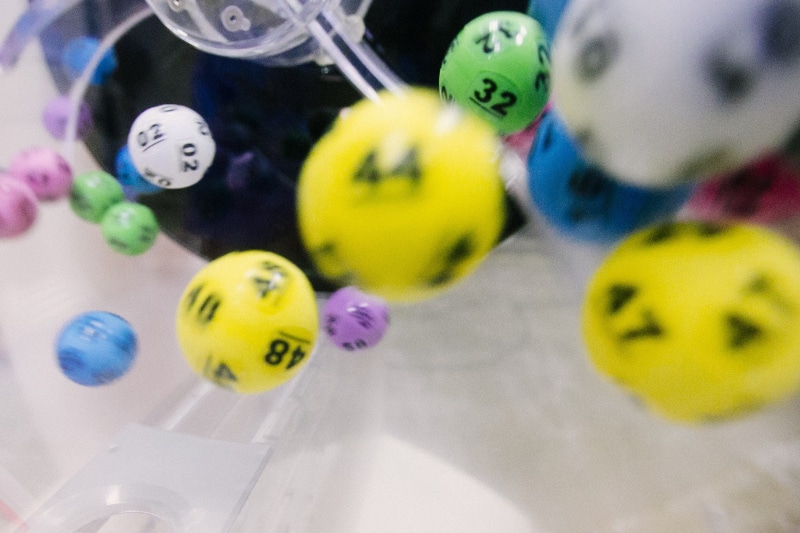 selective focus, indoors, 1080P, medium group of objects, focus on foreground, low, choice, balls, lotto balls, lotto, lottery, high angle view, no people