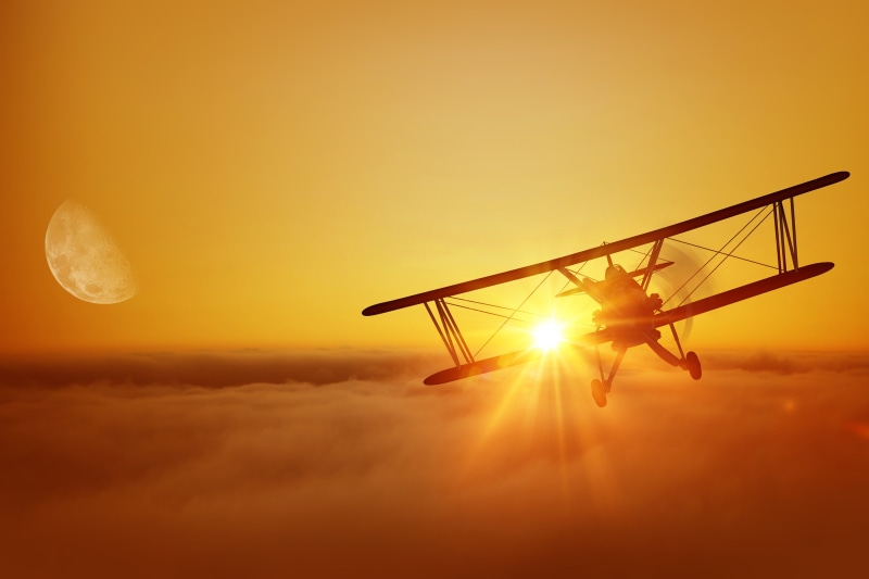 cloud - Sky, propeller, sunlight, back lit, black, the moon, flying, biplane, sky, sunbeam, orange color, silhouette, no people, beauty in nature
