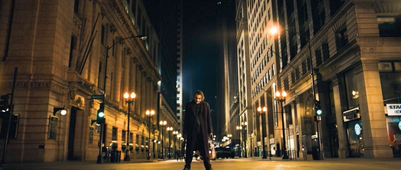 building exterior, corporate business, standing, front view, The Dark Knight, illuminated, Batman, one person, businesswoman, business person, full length